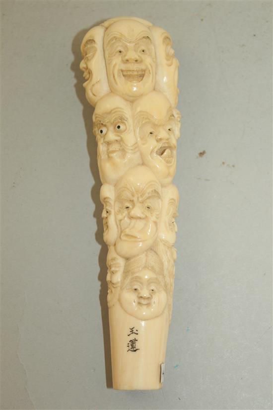 A Japanese ivory cane or parasol handle, early 20th century, 14.2cm